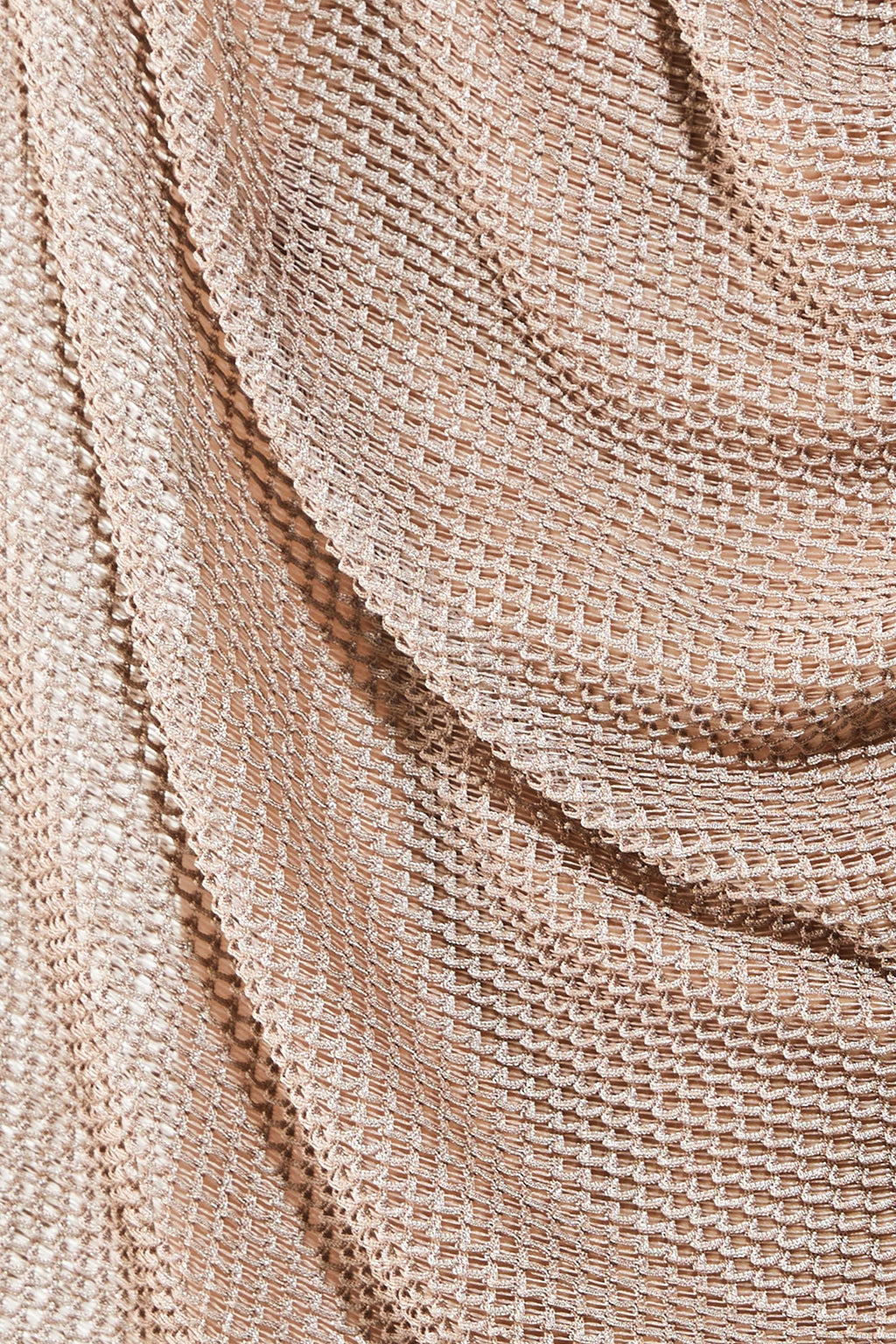 Close-up detail of breathable open-knit mesh fabric texture in beige showing see-through construction. Loose-weave knit pattern creates airy ventilation perfect for hot weather festivals and beach events. Durable yet lightweight material maintains shape while allowing maximum air circulation. Ideal for gay rave outfit, festival wear, and casual summer style where comfort meets bold transparent aesthetic. Unique texture adds visual interest to relaxed jogger silhouette.