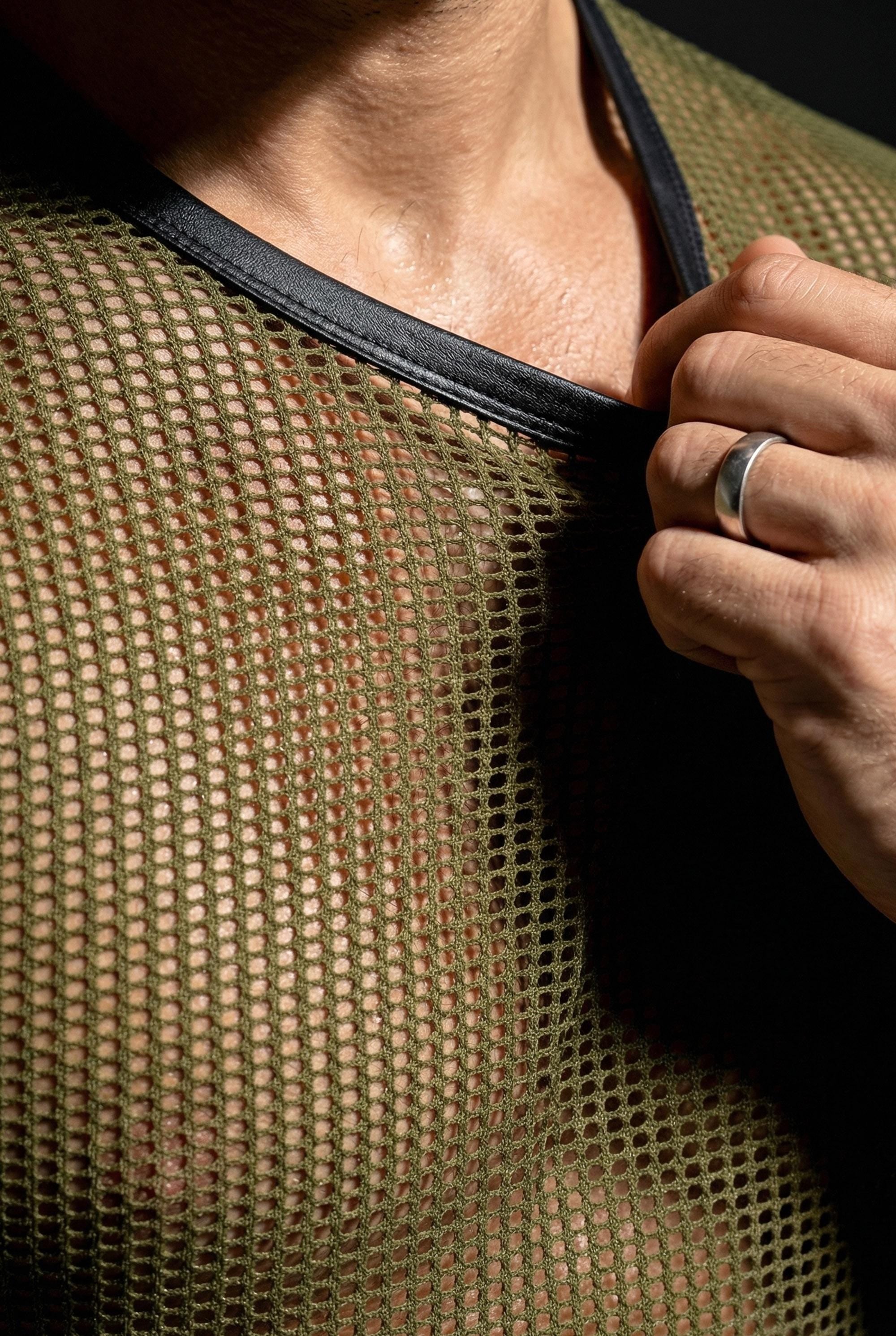 Close-up detail of breathable mesh fabric texture in olive green for lightweight rave crop top men