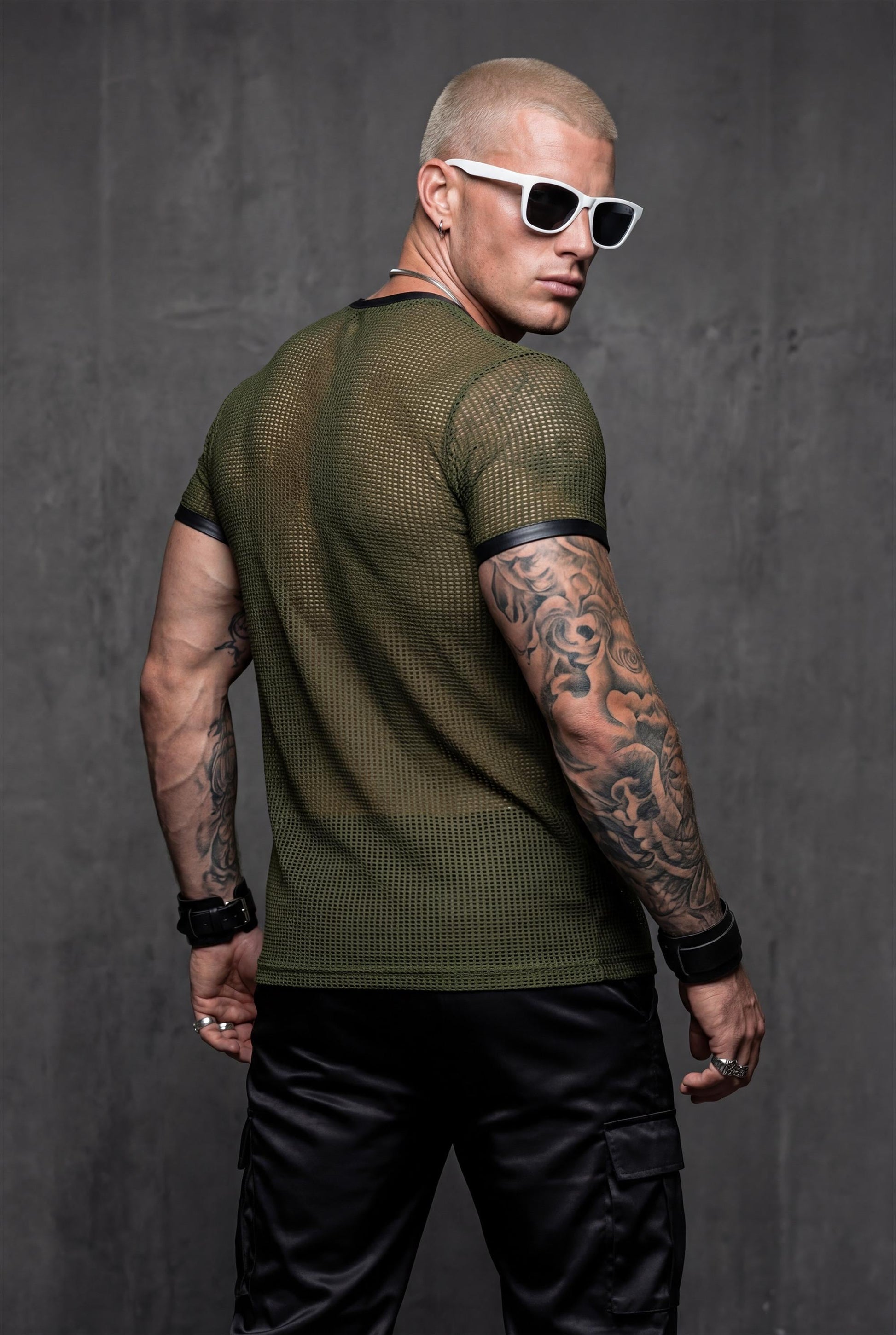 Sheer mesh t-shirt back view in army green showing transparent fabric for gay club outfit